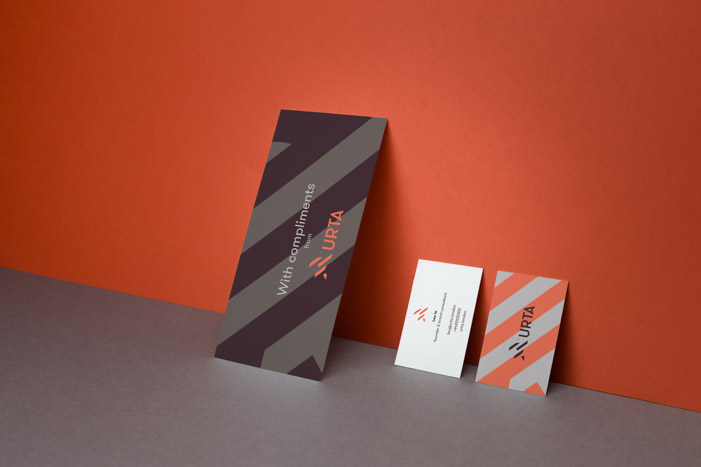 Comp slips and business cards for URTA feature geometric artwork made up from the logo mark and a clean typographic style.