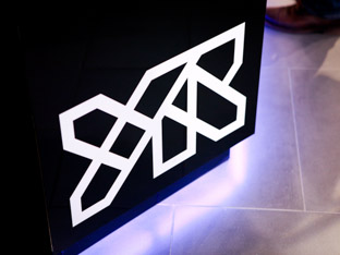 White YR logo on black in-store counter.