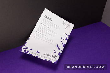 YR Store letterhead presenting a structured typographic layout with purple shards graphics.