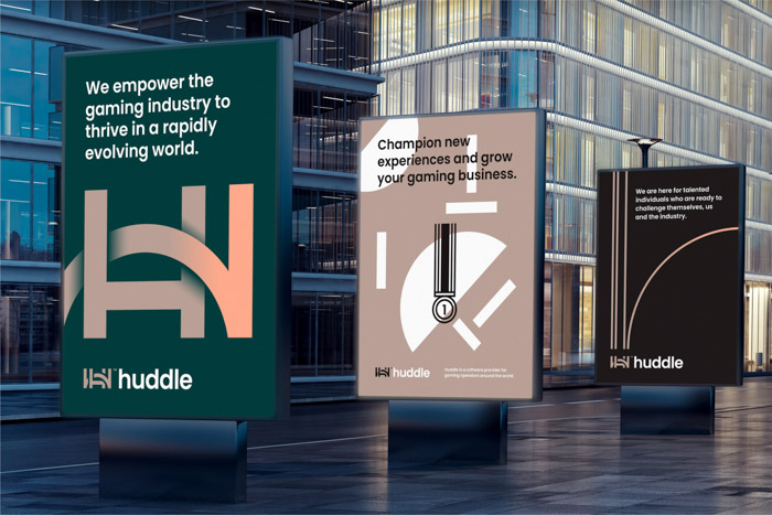 Poster designs showcasing the brand identity of gaming software company Huddle.
