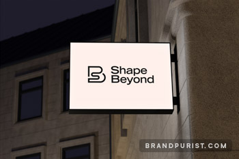 Shape Beyond logo visualised on an outdoor office sign.