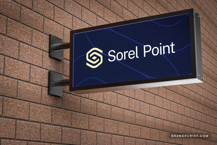 Concept of Sorel Point lightbox signage attached to a brick wall.