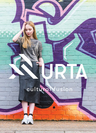 Lookbook photo with Shoreditch graffiti backdrop used in conjunction with a white URTA logo and 'Cultural Fusion' tagline.