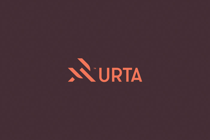 URTA logo mark made up of angular shapes resembling the letters U and A.