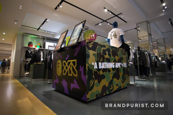 Side view of the YR x BAPE installation at Selfridges, wrapped in co-branded vinyl.