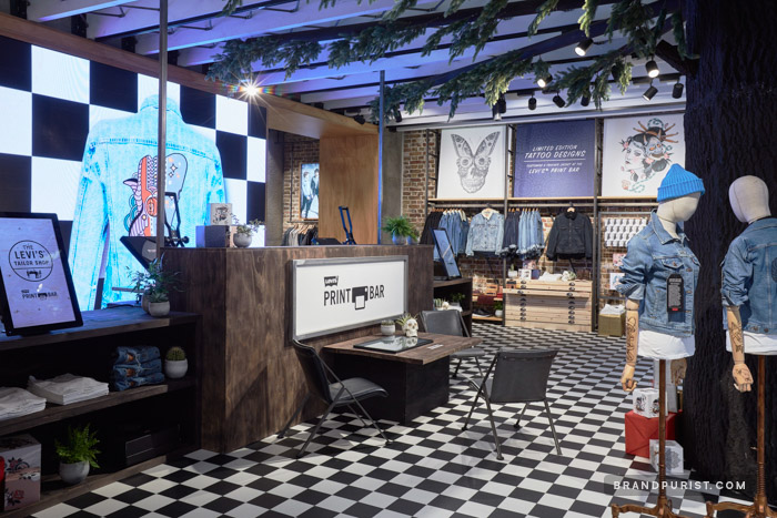 Levi’s tattoo parlour themed retail space built to promote denim jackets  customisable by YR’s technology.
