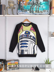 R2-D2 artwork printed via dye-sublimation on display at a Star Wars collector’s wall.