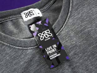 Screen printed swing tags with spot UV finish designed for YR Store garments.