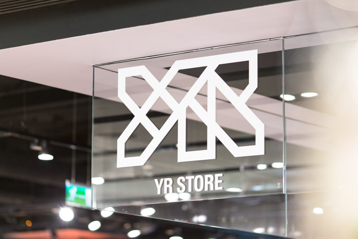 YR Store vinyl logo on glass at Topshop.
